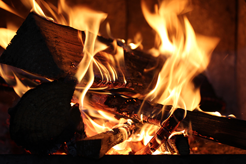 A fire in a fireplace.